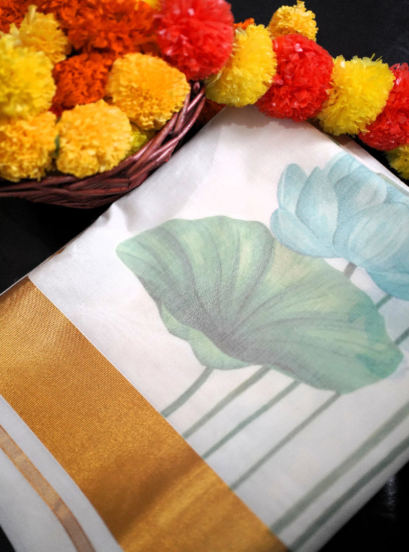 Decorative tablecloth with lotus designs and a basket of marigold flowers.